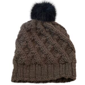 Surell brown knit beanie with black faux fur pom